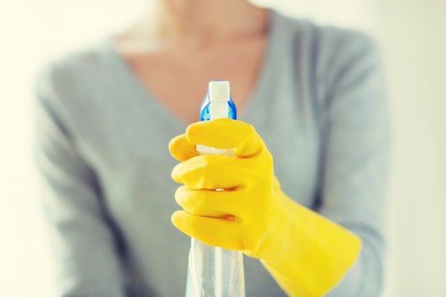 Cleaner reviewing a complaint form in a tidy service environment
