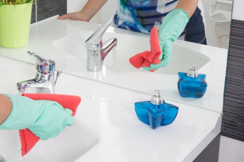 Local office cleaner handling shared workspace maintenance in Fulham
