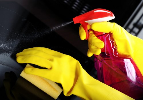 Professional home cleaning in a Fulham kitchen with careful attention to surfaces